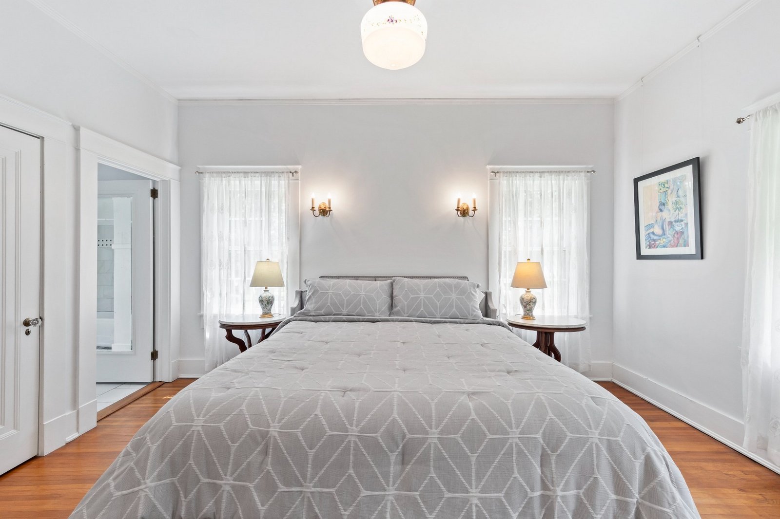 Professional primary bedroom real estate photography in Fayette Alabama